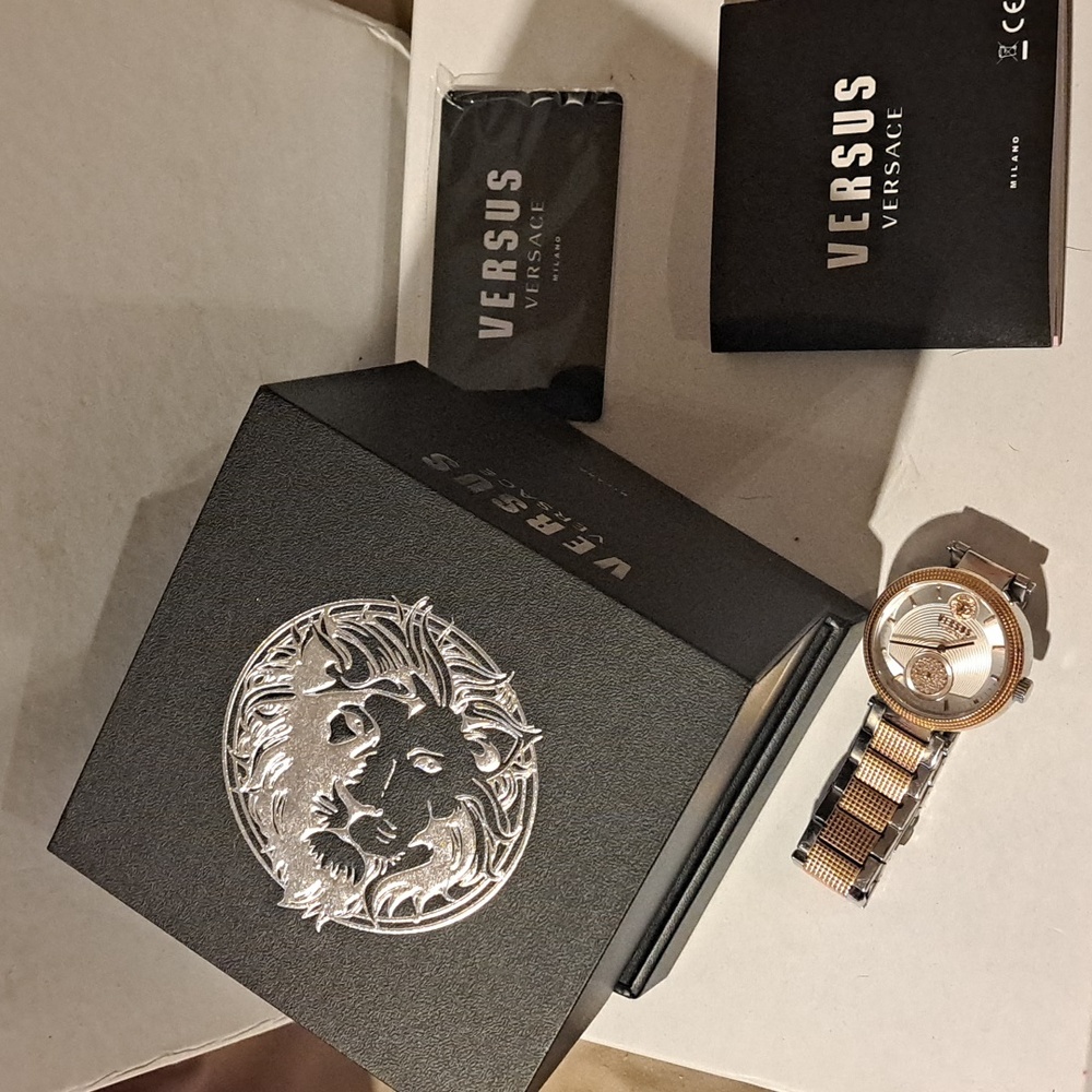Versace versus rose gold and sterling silver watch. 8 in